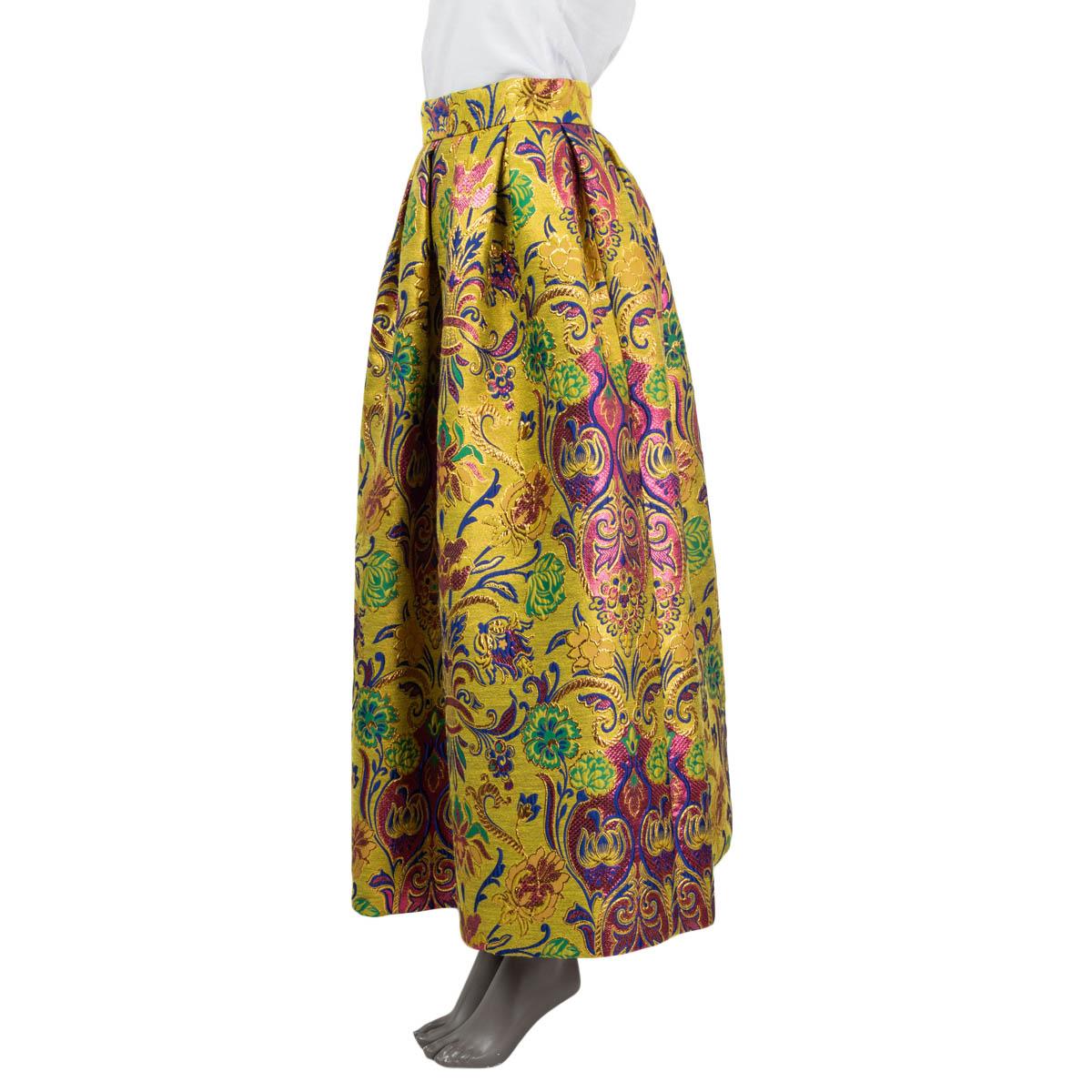 100% authentic Dolce & gabbana floral jacquard maxi skirt in yellow, pink, blue, green and gold polyester (67%), cotton (17%) and lurex (16%). Opens with a concealed zipper and a hook at the back. Lined in yellow silk (100%). Has been worn and is in