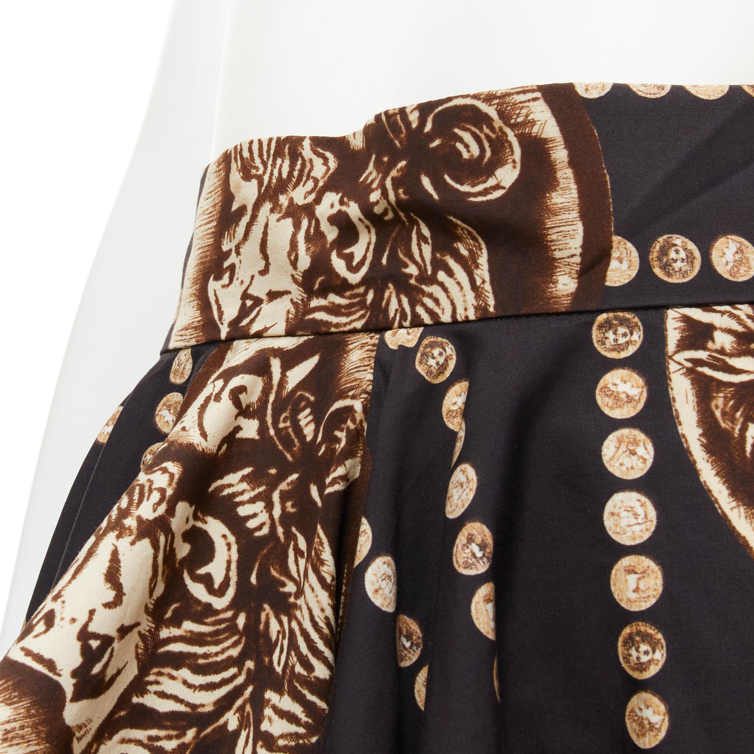 DOLCE GABBANA Antique Roman medallion coin black cotton flared skirt IT36 XS 
Reference: TGAS/B02058 
Brand: Dolce Gabbana 
Material: Cotton 
Color: Black 
Pattern: Abstract 
Closure: Zip 
Made in: Italy 

CONDITION: 
Condition: Excellent, this item