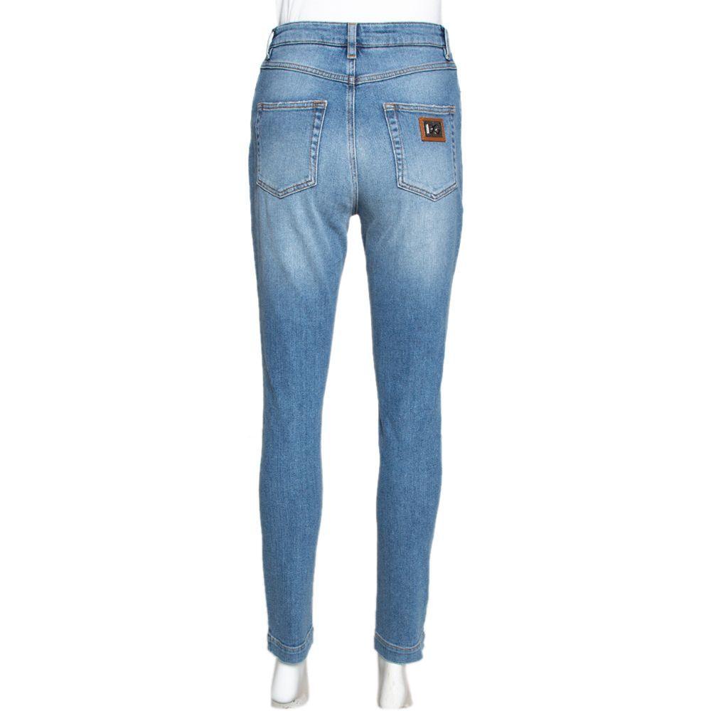 Make it big with these low-rise Pretty jeans in a light blue wash from Dolce & Gabbana. They have a flawless skinny fit. The jeans can be worn with either sneakers or heels. Pair them with a tank top and a short jacket.

