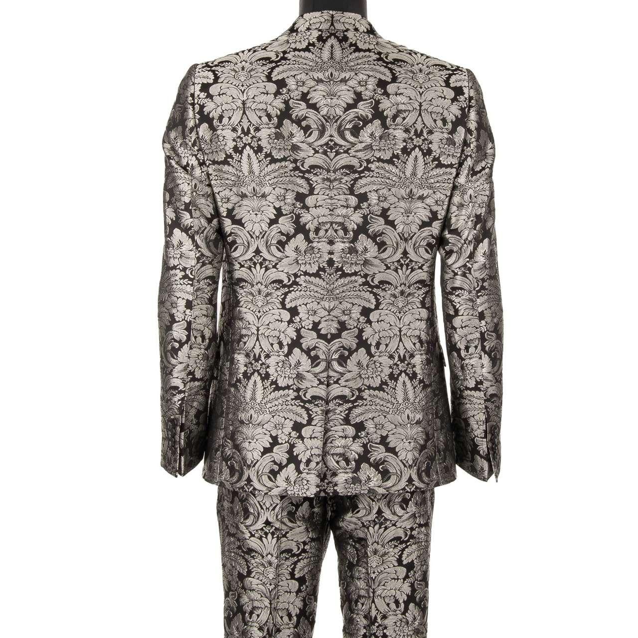 - Baroque jacquard suit with peak lapel in silver and black by DOLCE & GABBANA - MARTINI Model - RUNWAY - Dolce & Gabbana Fashion Show - New with tag - Former RRP: EUR 2,600 - MADE in ITALY - Slim Fit - Model: GK0RMT-FJ1RDQ-S8350 - Material: 40%