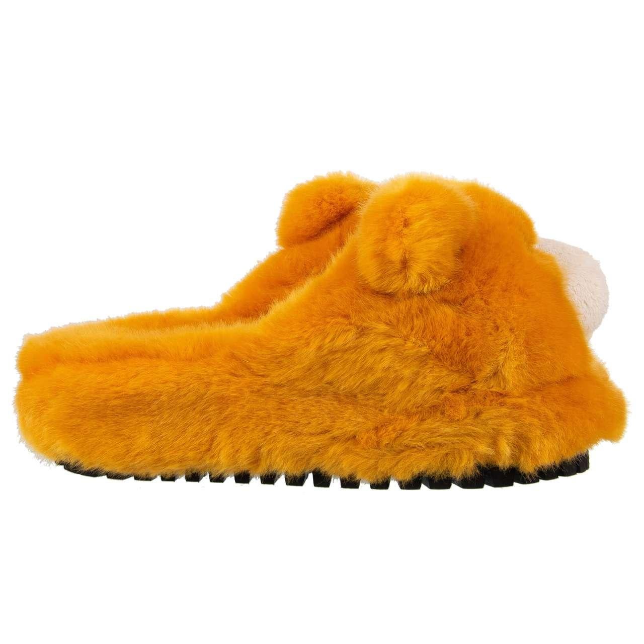 - Faux fur Bears slipper shoes SAINT BARTH with rubber sole in orange by DOLCE & GABBANA - MADE IN ITALY - New with Box - Model: CS1631-AU727-87546 - Material: 100% Eco faux fur - Sole: Leather - Color: Orange - Rubber sole - Sizes (appr. values): -