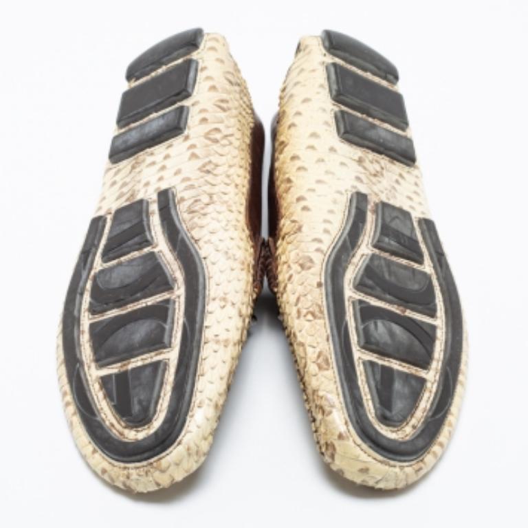 The rubber soles and leather insoles make these Dolce & Gabbana loafers enduring. Created from snakeskin leather, the upper of the pair features a branded accent and it is appealing with contrasting trims. The slip-on fitting of these shoes enhances