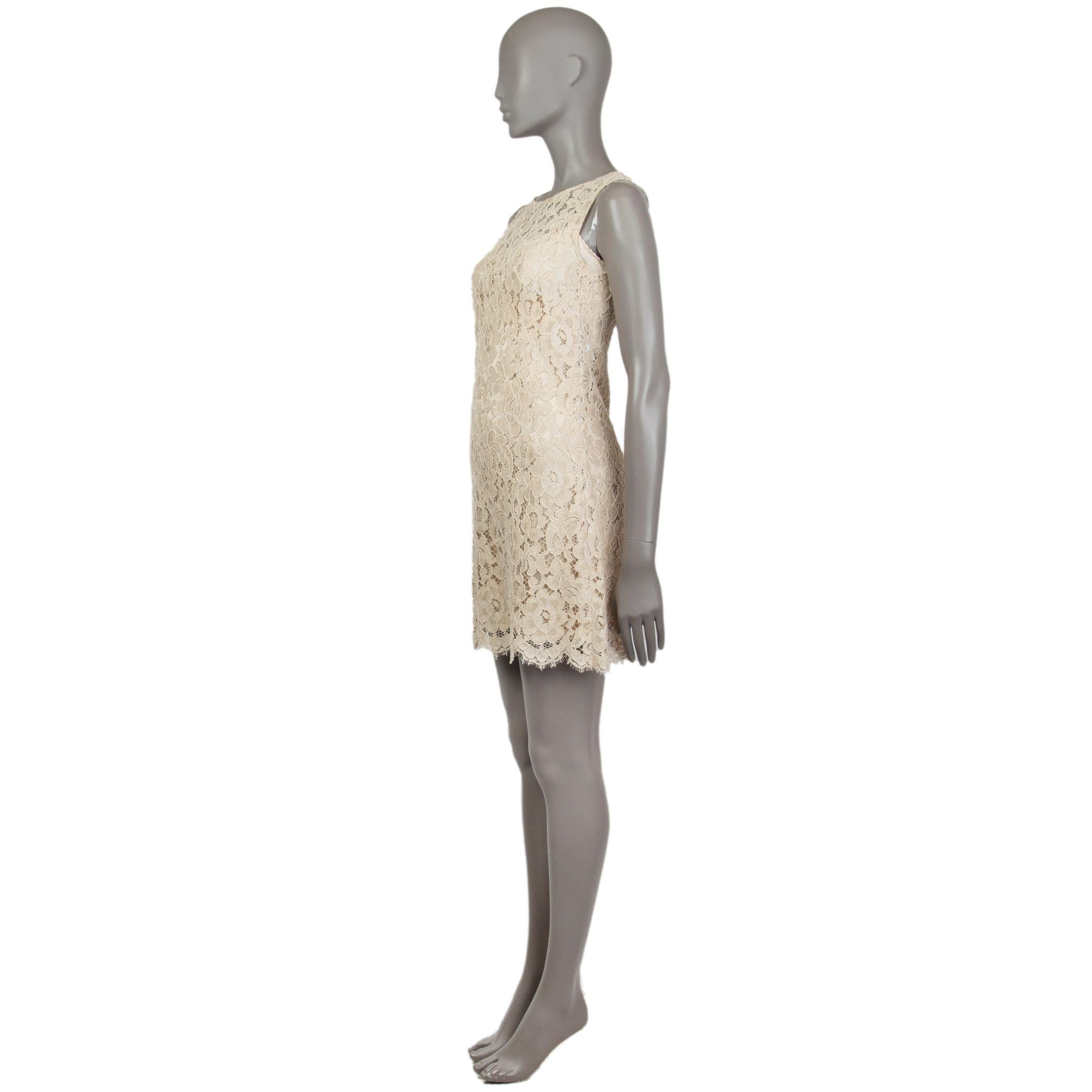 Dolce & Gabbana lace shift dress in beige, cotton (90%) and nylon (10%). Closes with consealed metal zipper on the back. Comes with slip dress in beige silk (96%) and elastane (4%). Has been worn in excellent condition. 

Tag Size 40
Size S
Bust