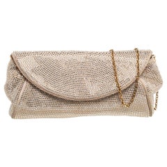 Dolce
Gabbana Beige Crystal Embellished Suede Flap Chain Clutch Used Dolce
Gabbana Beige Crystal Embellished Suede Flap Chain Clutch