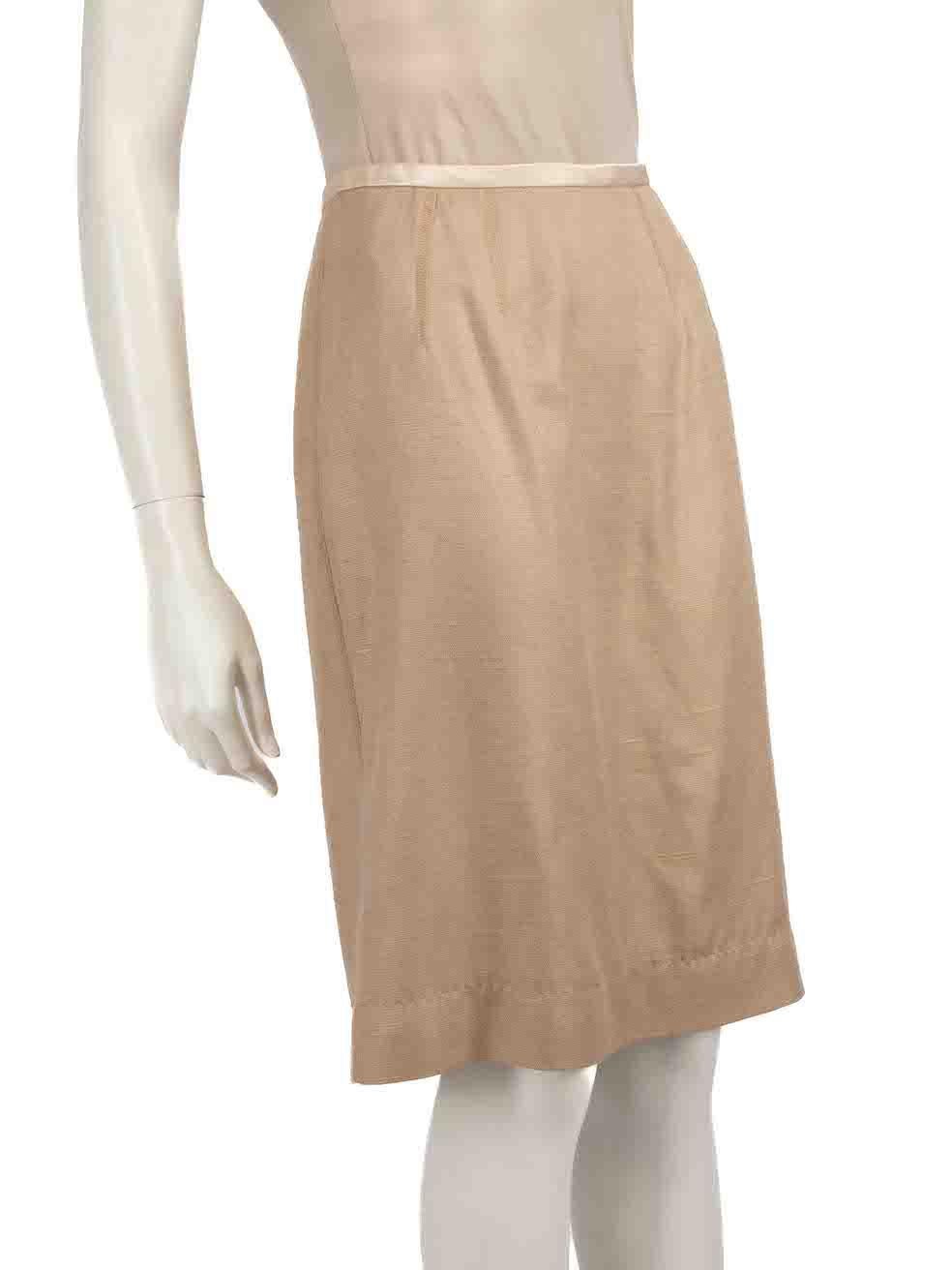 CONDITION is Very good. Minimal wear to skirt is evident. Minimal discolouration to the front right side of the waistband as well as the rear lining near vent on this used Dolce & Gabbana designer resale item.
 
 
 
 Details
 
 
 Beige
 
 Silk
 
