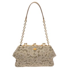 Dolce & Gabbana Beige Lace And Leather Kiss Lock Frame Clutch