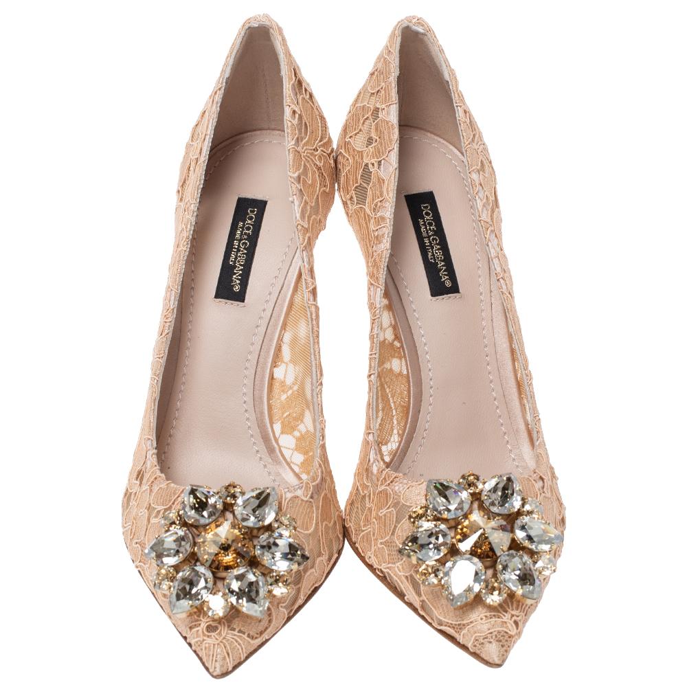 From their shape and detailing to their overall appeal, these Dolce & Gabbana pumps are utterly mesmerizing. The pumps are crafted from lace and decorated with crystals on their pointed toe box. They are complete with comfortable leather-lined