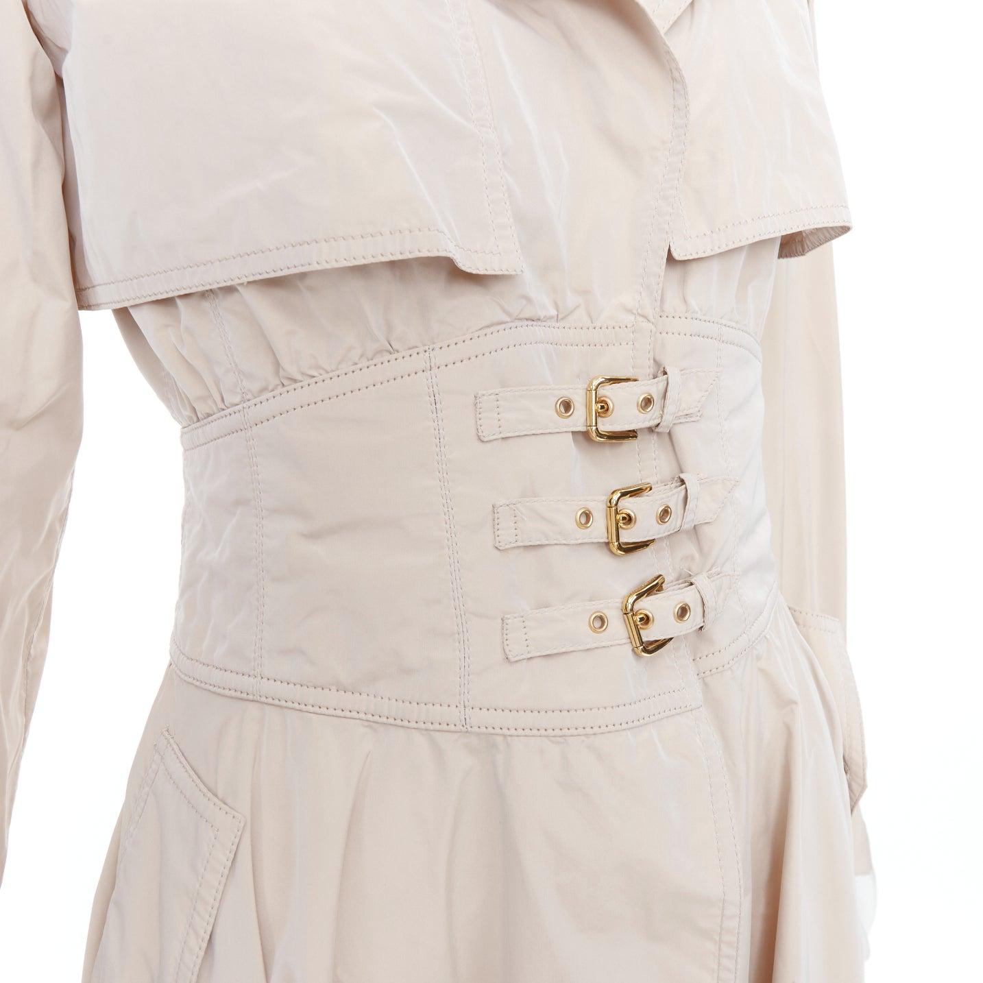 DOLCE GABBANA beige nylon belted waist Aline trench coat dress IT40A S
Reference: GEGG/A00172
Brand: Dolce Gabbana
Designer: Domenico Dolce and Stefano Gabbana
Material: Nylon
Color: Beige, Gold
Pattern: Solid
Closure: Snap Buttons
Extra Details:
