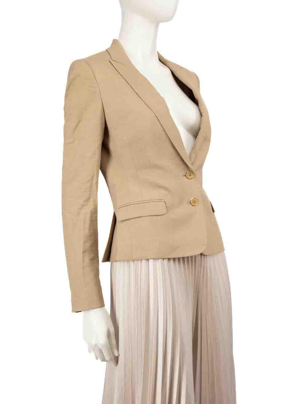 CONDITION is Very good. Minimal wear to the blazer is evident. Minimal tarnishing to the buttons on this used Dolce & Gabbana designer resale item.
 
 
 
 Details
 
 
 Beige
 
 Viscose
 
 Blazer
 
 Single breasted
 
 Button up fastening
 
 Shoulder
