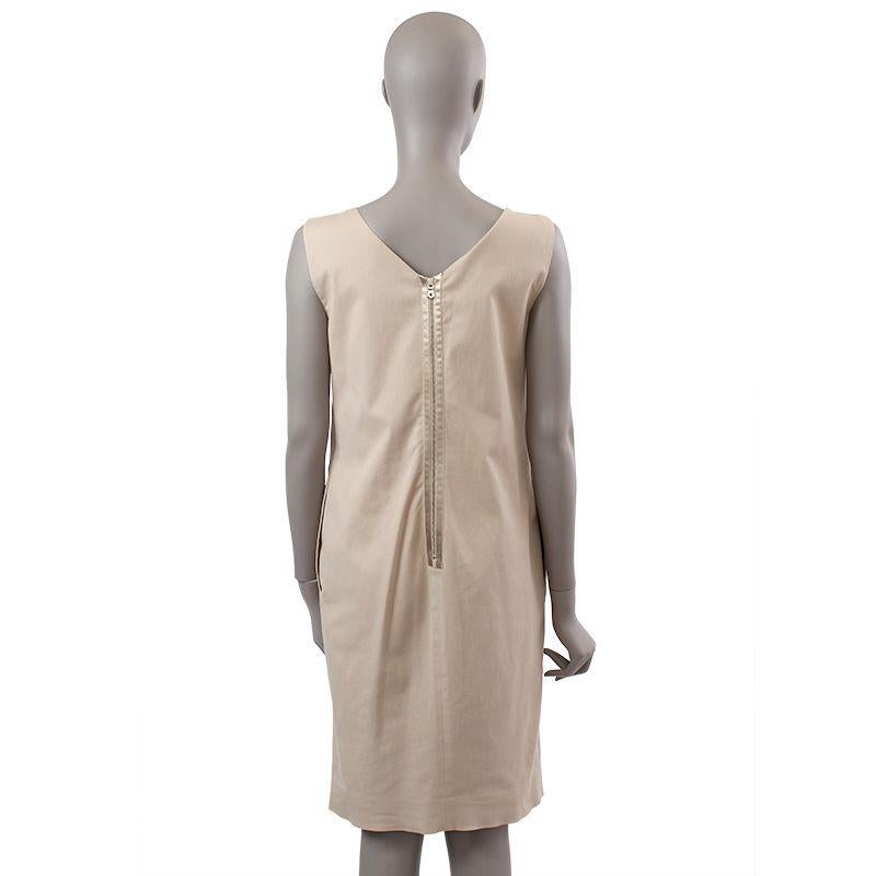 Dolce & Gabbana sleeveless dress in beige cotton blend (probably, as content tag is missing). Opens with a zipper on the back. Has been worn and is in excellent condition.

Tag Size 42
Size M
Shoulder Width 90cm (35.1in)
Bust To 88cm (34.3in)
Waist