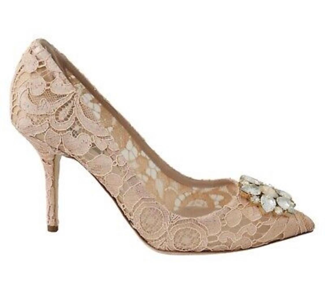 DOLCE & GABBANA

Gorgeous brand new with tags, 100% Authentic Dolce & Gabbana PUMP lace shoes with jewel detail on the top.

Model: Pumps
Color: Beige and pink (albicocca) 
Material: 36% Leather, 5% PA, 2% Silk, 57% Viscose
Sole: Leather
Logo