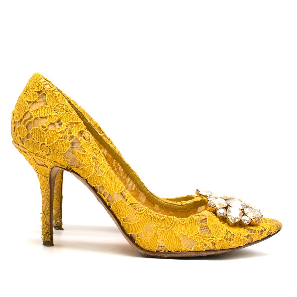 Dolce & Gabbana Bellucci Taormina Yellow Lace Pumps

-Yellow, laced
-Crystal toe detailing 
-Pointed toe
-Yellow leather insole

Please note, these items are pre-owned and may show some signs of storage, even when unworn and unused. This is