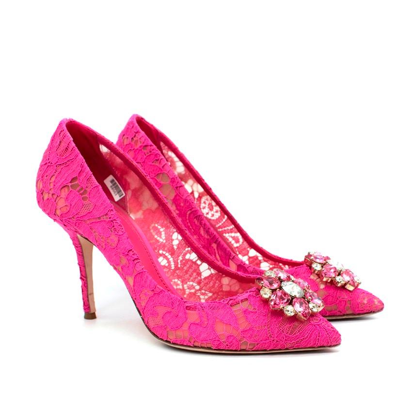 Dolce & Gabbana Belluci Taormina Pink Lace Embellished Pumps
 

 - Heart shaped Swarovski crystal embellishment to the pointed toe
 - Pink Taormina corded lace upper, backed by tonal mesh for stability and trimmed with tonal grosgrain for comfort
 -