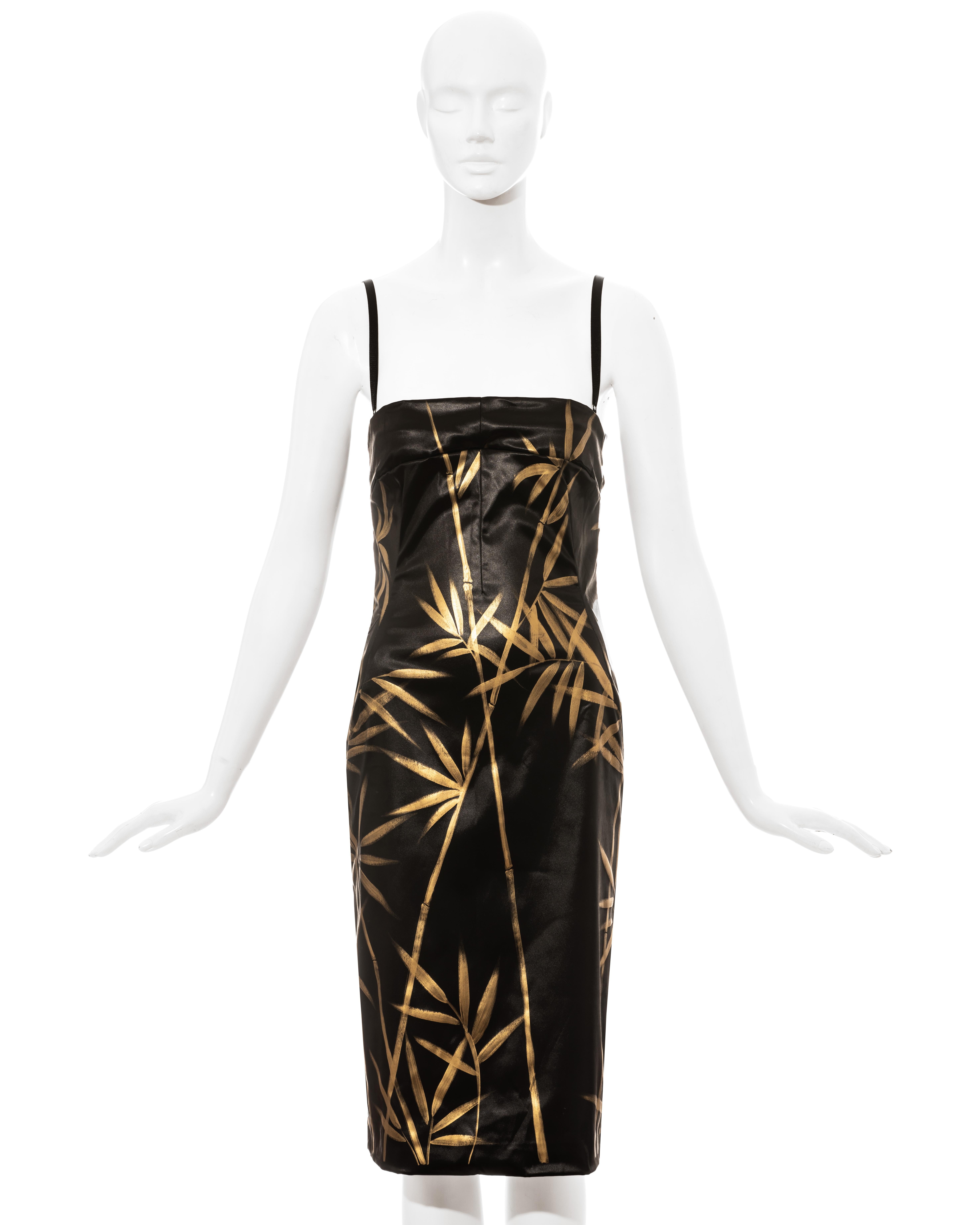 Dolce & Gabbana black wet look mid-length evening dress with gold painted plant print and built-in adjustable bra. 

Spring-Summer 1999
