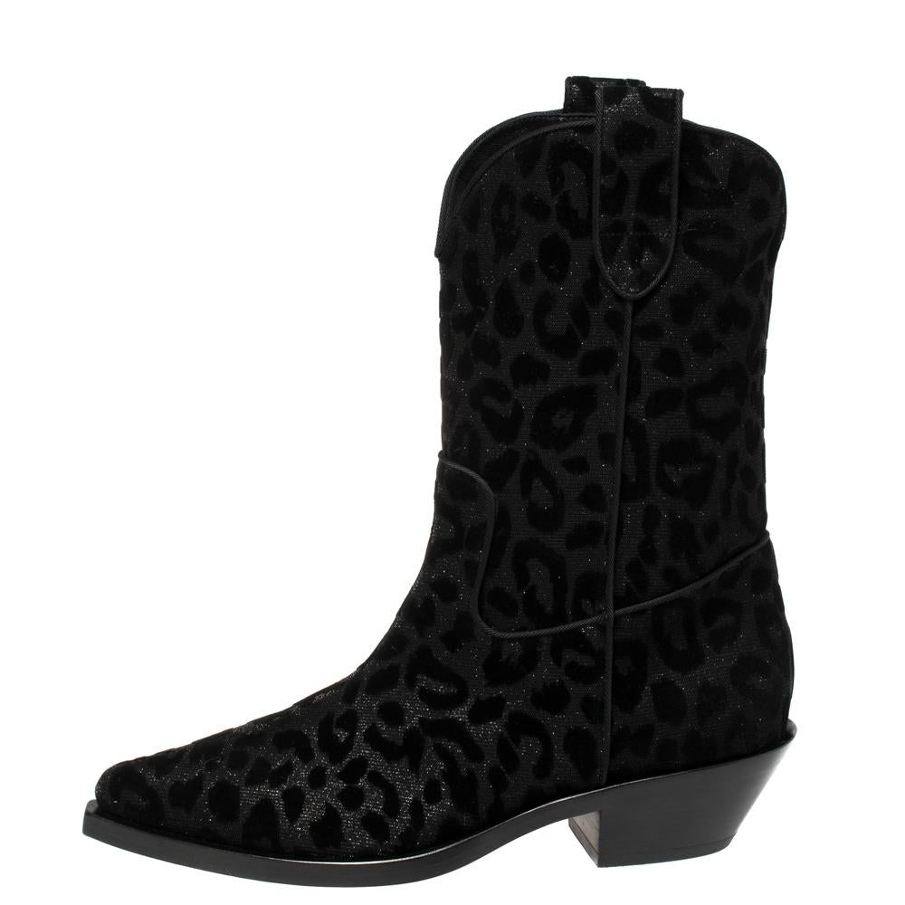 Known for its finesse and impeccable artistry, Dolce & Gabbana again surprises us with these stylish cowboy boots. Crafted from animal-printed lurex and velvet, the boots feature pointed toes and are lined with leather. Small heels complete these