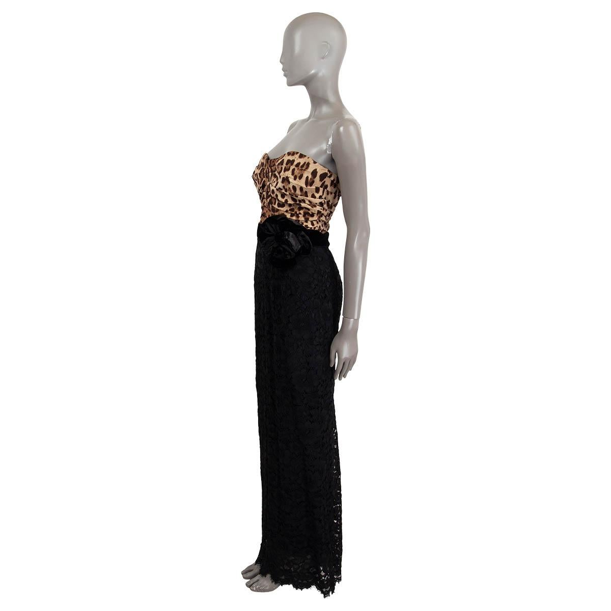 100% authentic Dolce & Gabbana leopard print bustier maxi dress in black, brown and sage rayon (50%), silk (30%), cotton (15%), cupro (3%) and elastane (2%). Features a big satin flower at the waist and a satin belt. Opens with a concealed zipper