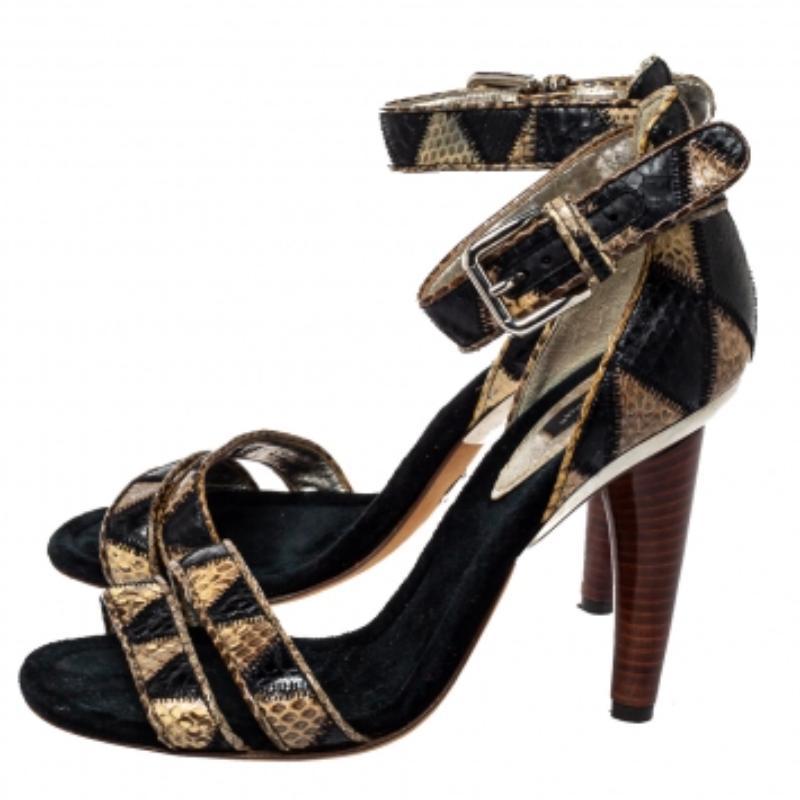 Take your style a few notches higher with these sandals from Dolce & Gabbana. Crafted from python skin, the pair is styled with open toes, ankle straps, and high heels. These sandals will look great with your casual outfits. (NOTE: FOR UAE CUSTOMERS