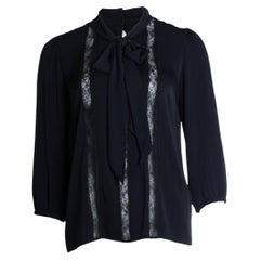 Dolce & Gabbana, black blouse with bow and lace