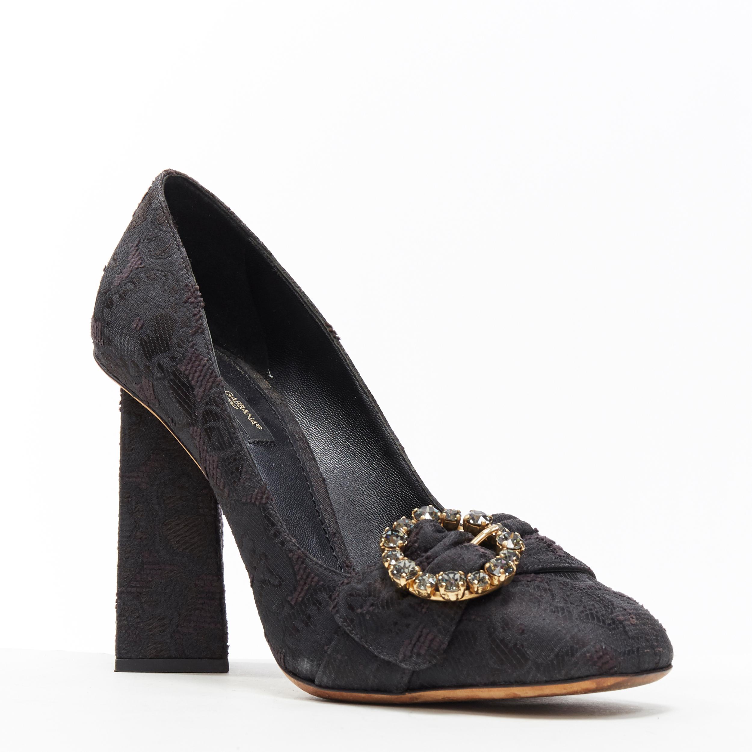 DOLCE GABBANA black brocade strass crystal brooch angular heel pump EU39
Brand: Dolce Gabanna
Model Name / Style: Brocade pump
Material: Fabric
Color: Black
Pattern: Floral
Extra Detail: Angular twisted heel design. Ultra High (4 in & Higher) heel
