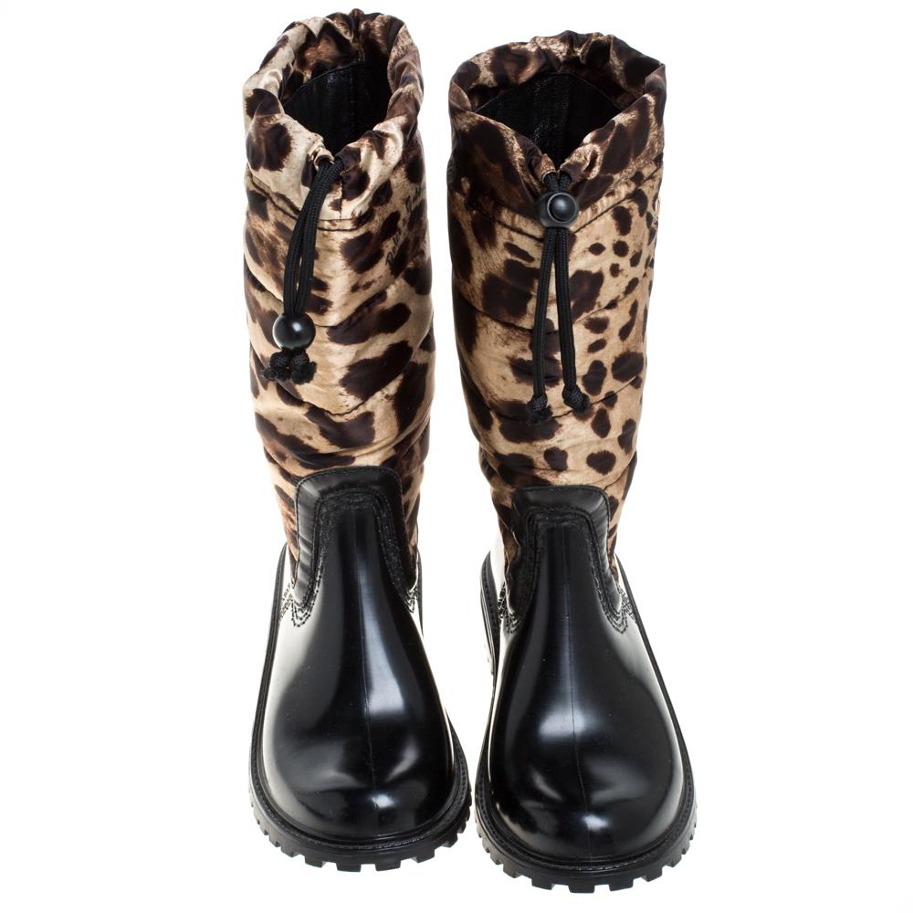 Show up on a rainy day with style in these rain boots from Dolce & Gabbana. They are made from rubber and panels of nylon in leopard prints. Because the boots are made of rubber, they will surely keep you dry and stylish even when pouring. They are