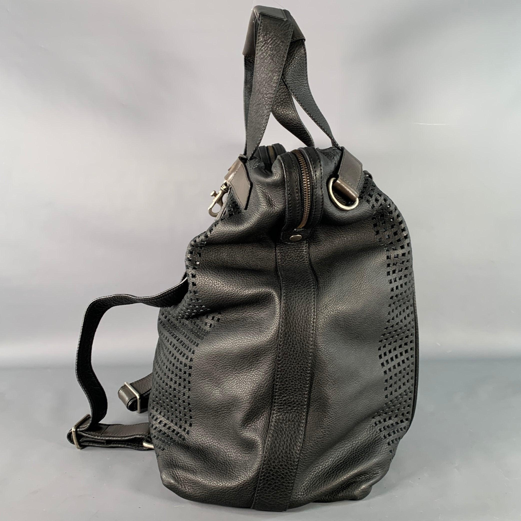 Noir DOLCE & GABBANA Sac à dos de nuit en cuir perforé noir et marron en vente