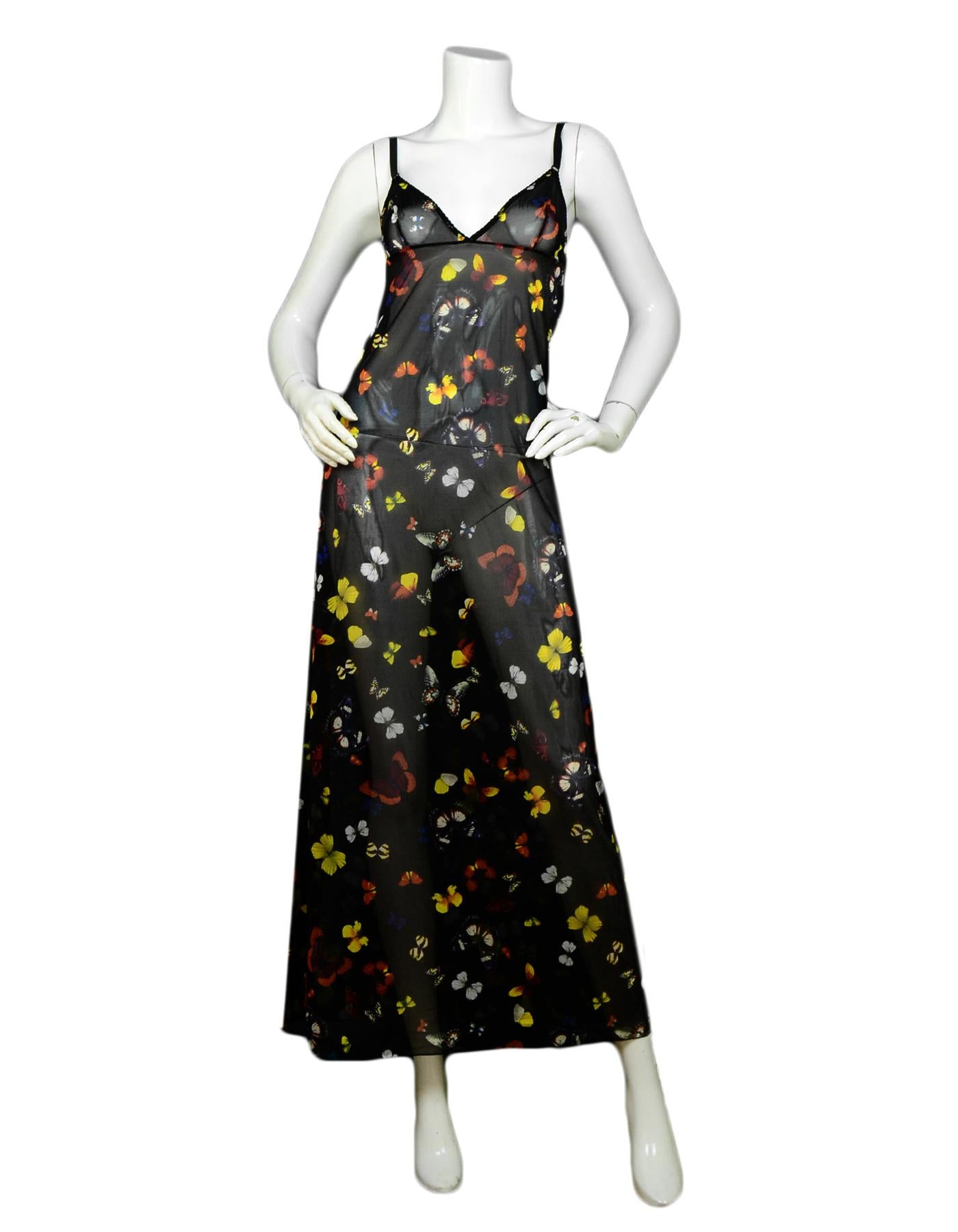 Dolce & Gabbana Black Butterfly Print Sheer Dress

Color: Black, butterfly print
Materials: Missing composition tag
Opening/Closure: Pullover
Overall Condition: Very good pre-owned condition, with missing composition and size tags
Tag Size: Size tag