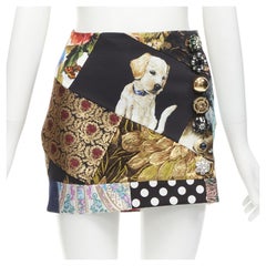 DOLCE GABBANA mini gonna nera con patchwork di cani colorati e gioielli IT36 XS