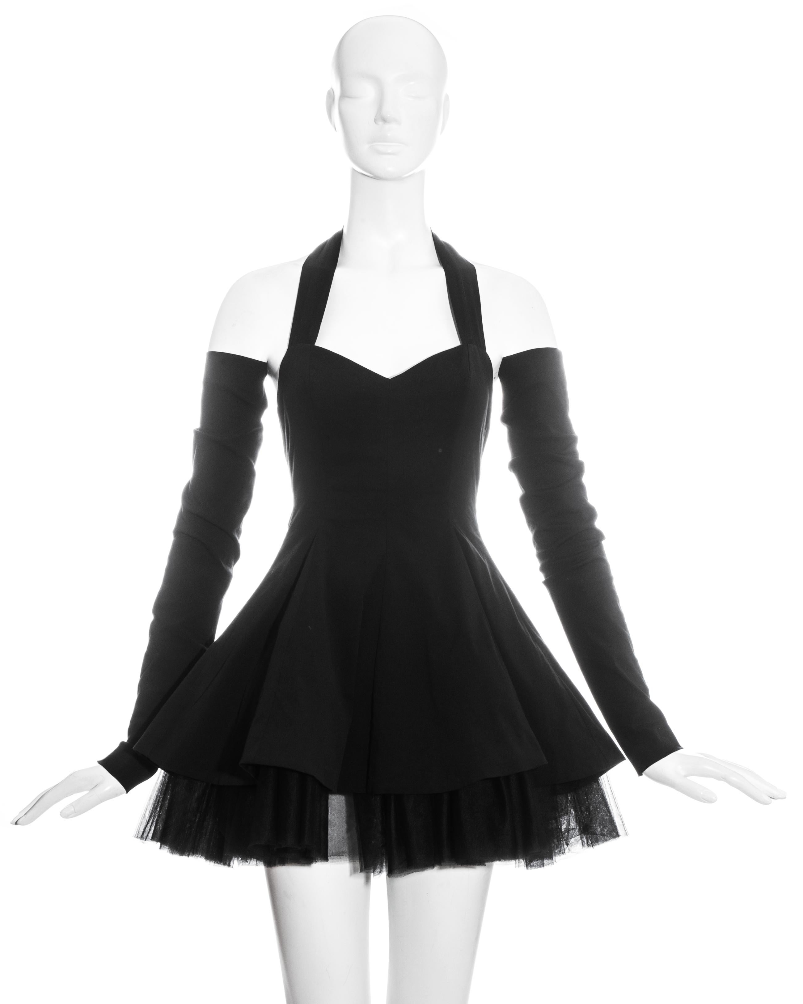 Dolce & Gabbana black cotton halter neck mini dress with tulle underskirt and separate sleeves.

Spring-Summer 1992