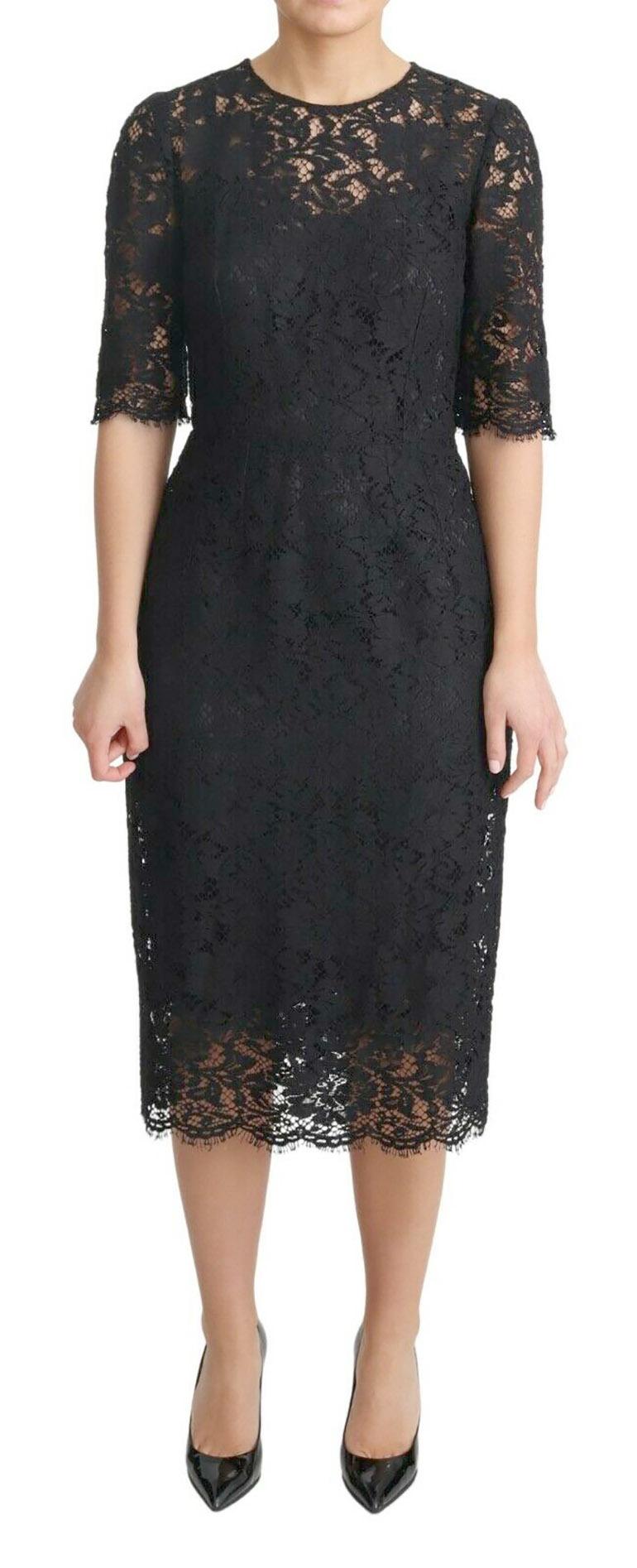 Wunderschöne Marke neu mit Tags, 100% Authentic Dolce & Gabbana kurzen Ärmeln Etuikleid ist in zarten floralen Spitze überlagert.

Modell: Midikleid kurzarm

Farbe: Schwarz

Reißverschluss auf der Rückseite
Innenfutter aus Seidenstretch

Details zum