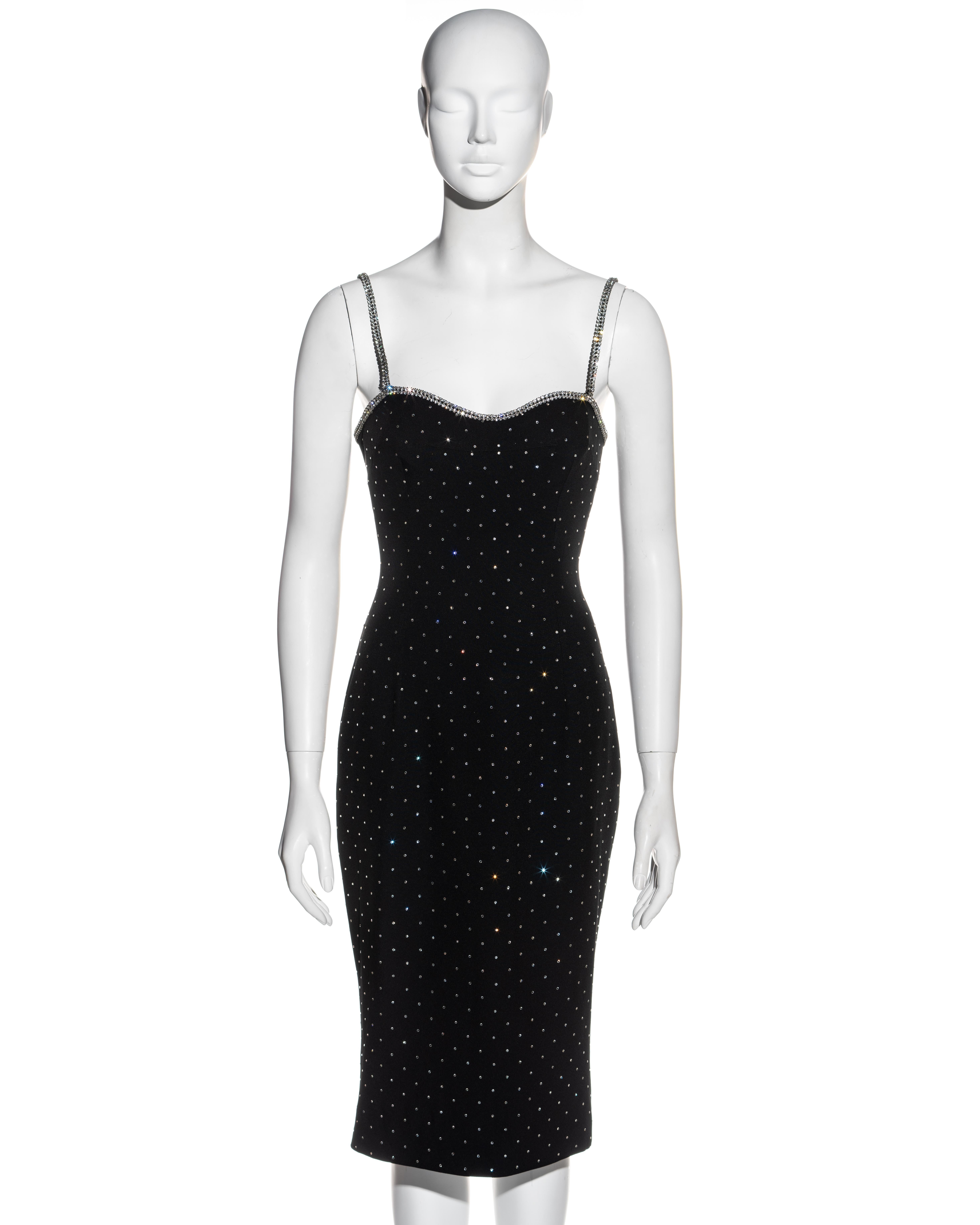 ▪ Dolce & Gabbana black crepe wiggle dress
▪ 79% Acetate, 21% Rayon
▪ Adorned with thousands of crystals 
▪ Hour glass shape 
▪ Centre-back vent 
▪ Crystal spaghetti straps 
▪ Concealed zipper 
▪ IT 42 - FR 38 - UK 10 - US 6
▪ Spring-Summer 1995
