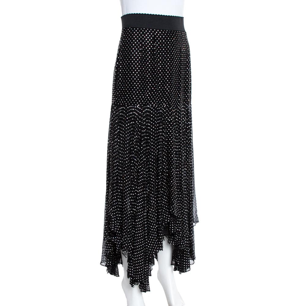 Dolce & Gabbana’s black skirt is for days of style. Cut beautifully, it has a scalloped waistband and crystal embellishments all over the falling skirt. The silk creation has an asymmetrical hemline and a zip closure.

