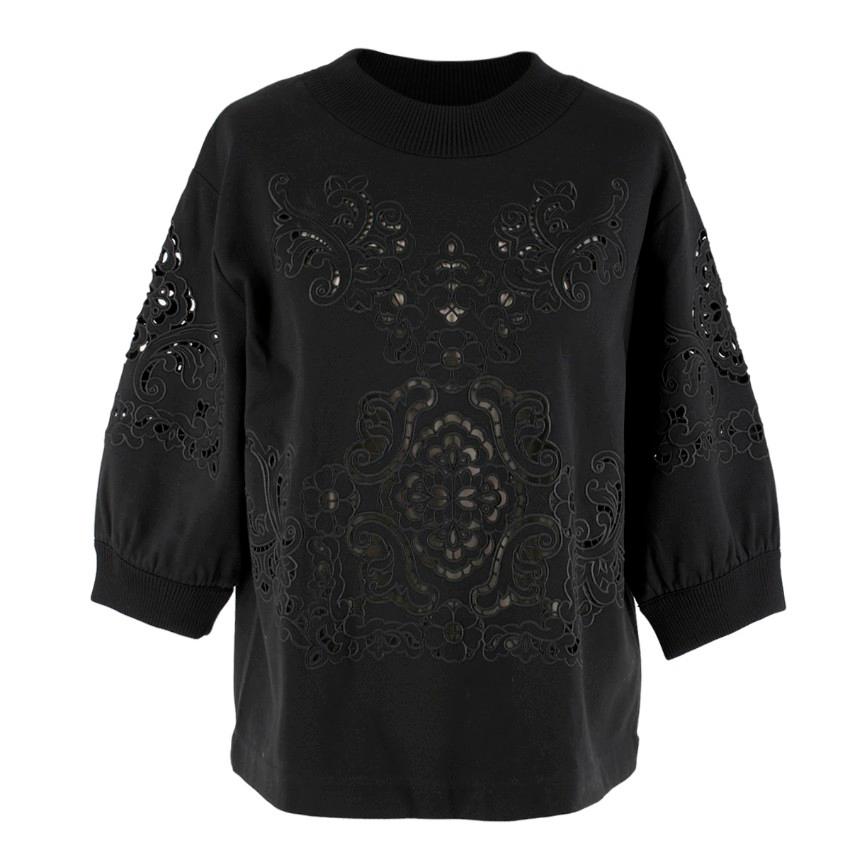 Dolce & Gabbana Black Cut-Out Embroidery Sweatshirt

- Ribbed neckline and cuffs
- Cropped sleeves
- Cotton sweatshirt
- Detailed cut-out embroidery
- Boxy fit

Please note, these items are pre-owned and may show some signs of storage, even when