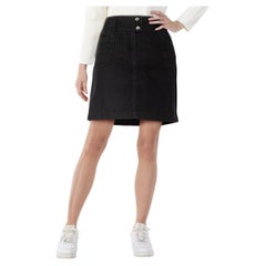 Dolce & Gabbana Minifalda vaquera negra con placa del logotipo Talla S