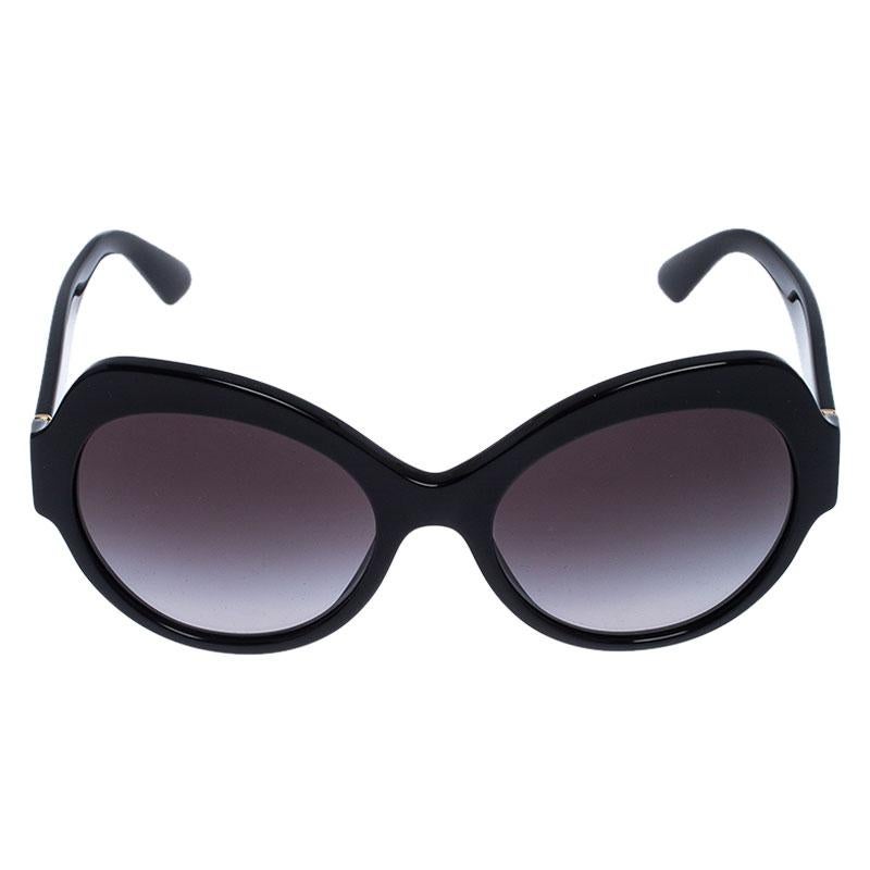 The stylish frame sculpted in black acetate into a cat-eye shape and signature accents on the sides, make these sunglasses a high-fashion accessory that you must own. From the house of Dolce & Gabbana, they will look best with your daytime statement