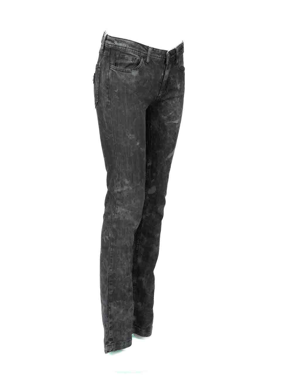 CONDITION is Very good. Hardly any visible wear to jeans is evident on this used Dolce & Gabbana designer resale item. Please note that the tarnishing to metal plate on back right pocket is intentional.
 
Details
Black
Cotton denim
Jeans
Straight