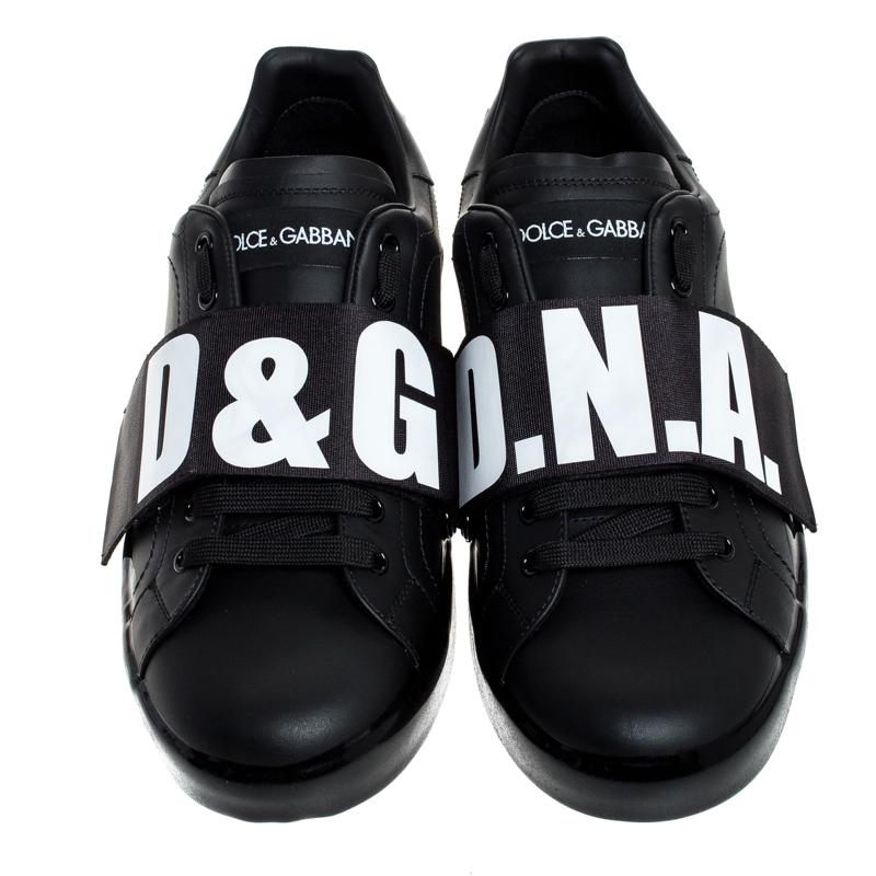 This pair of Dolce & Gabbana sneakers will make a mark for themselves in your closet. Crafted from leather, they come in a classic shade of black. They come equipped with lace-up fronts, logo straps, leather insoles as well as rubber soles. The