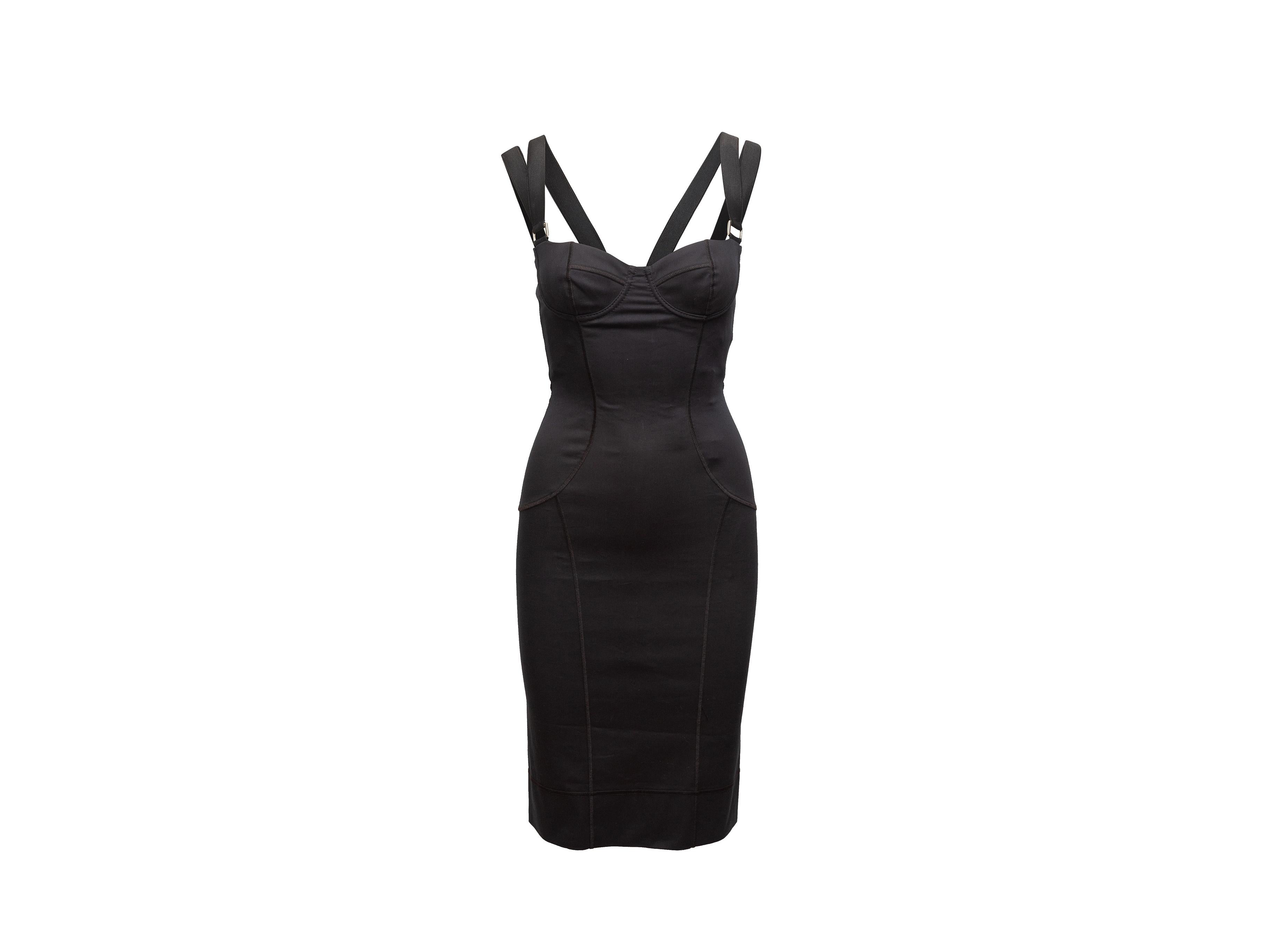 Product details: Black fitted satin bustier dress by Dolce & Gabbana. Sweetheart neckline. Elastic shoulder straps. Exposed zip closure at center back. Designer size 38. 28