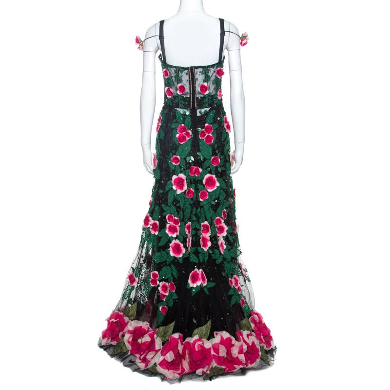 To help you evoke the most mesmerizing visions of life is this gown from Dolce & Gabbana's Spring 2018 collection. It is a marvellous design, achieved by assembling blooming flowers on soft fabrics and then sewing it into a dreamy silhouette. The