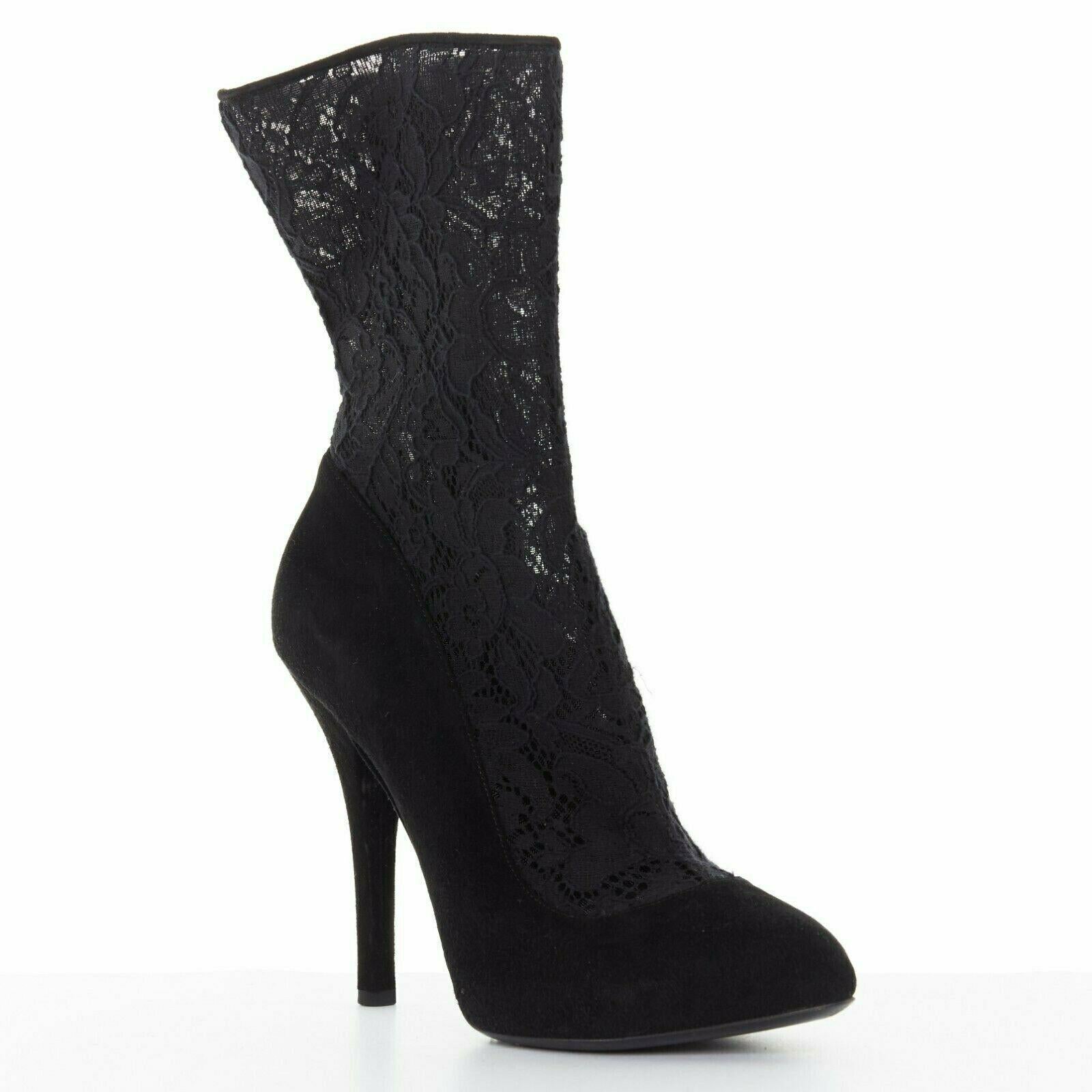 DOLCE GABBANA black floral lace mesh sock suede pump design short bootie EU39 
Reference: JECN/A00003 
Brand: Dolce Gabbana 
Designer: Domenico Dolce and Stefano Gabbana 
Material: Suede 
Color: Black 
Pattern: Other 
Closure: Zip Extra Detail: