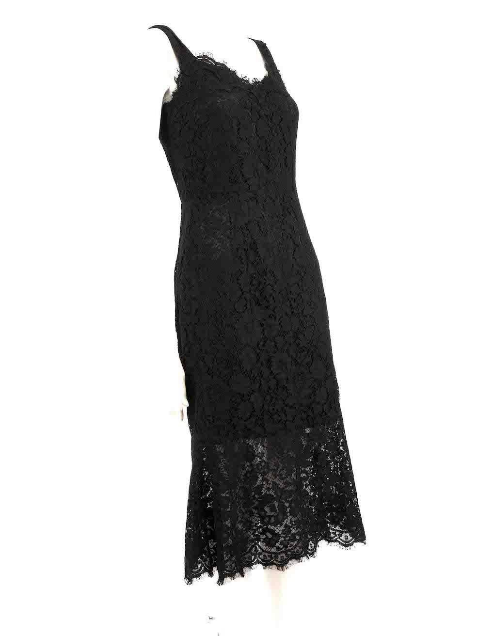 CONDITION is Very good. Minimal wear to dress is evident. Minimal wear to the front with holes to the lace and the trims with light fraying on this used Dolce & Gabbana designer resale item.
 
 Details
 Black
 Lace
 Dress
 Midi
 V-neck
 Sleeveless

