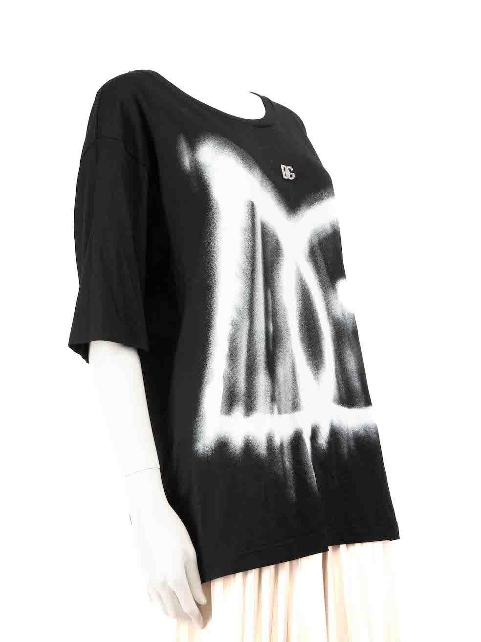 CONDITION is Very good. Minimal wear to top is evident. Minimal wear to the front crystal logo that is partly detached on this used Dolce & Gabbana designer resale item.
 
 
 
 Details
 
 
 Black
 
 Cotton
 
 T-shirt
 
 White graffiti logo print
 
