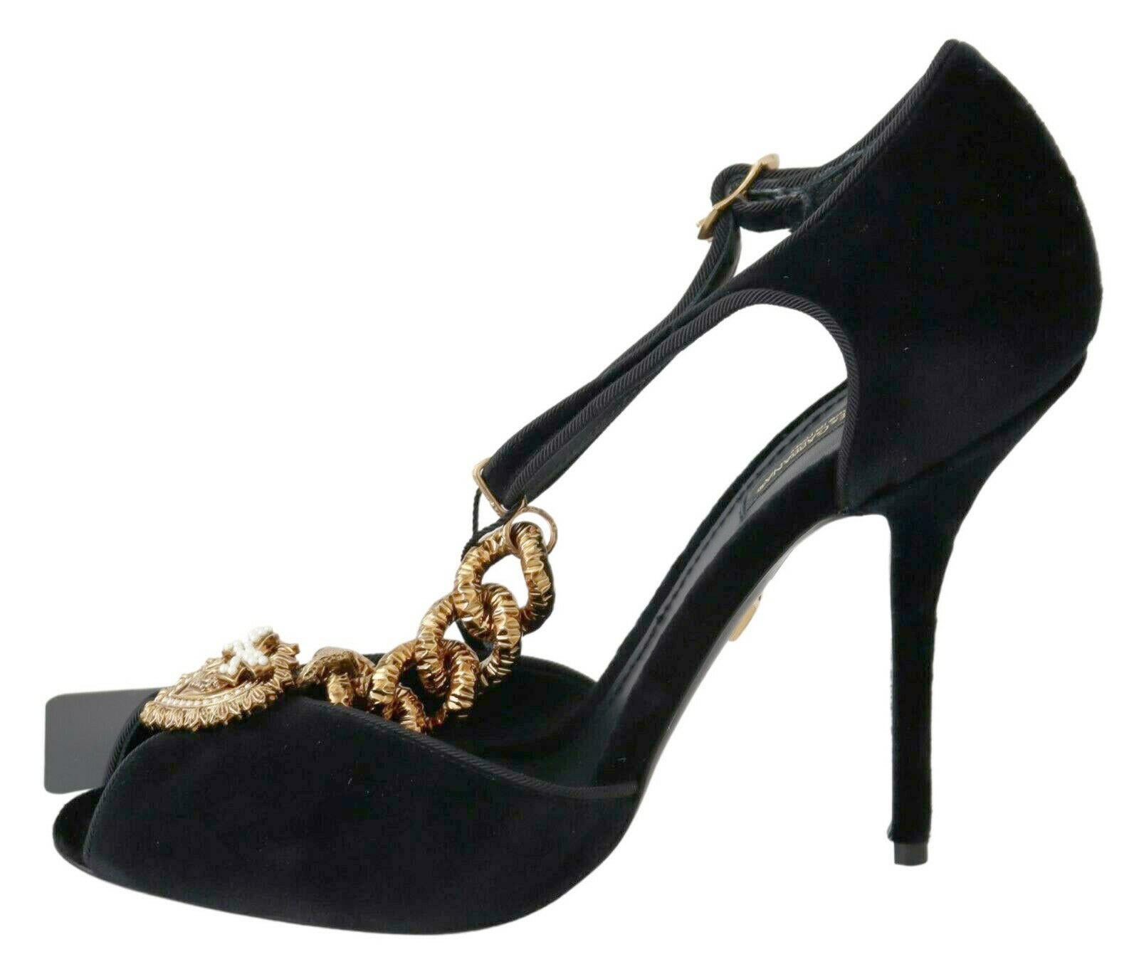 Gorgeous brand new with tags, 100% Authentic Dolce & Gabbana Black Devotion pumps. A laconic outfit will only benefit from the decoration made in the jewelry technique in the form of a large twisted chain and encrusted with miniature pearls of the