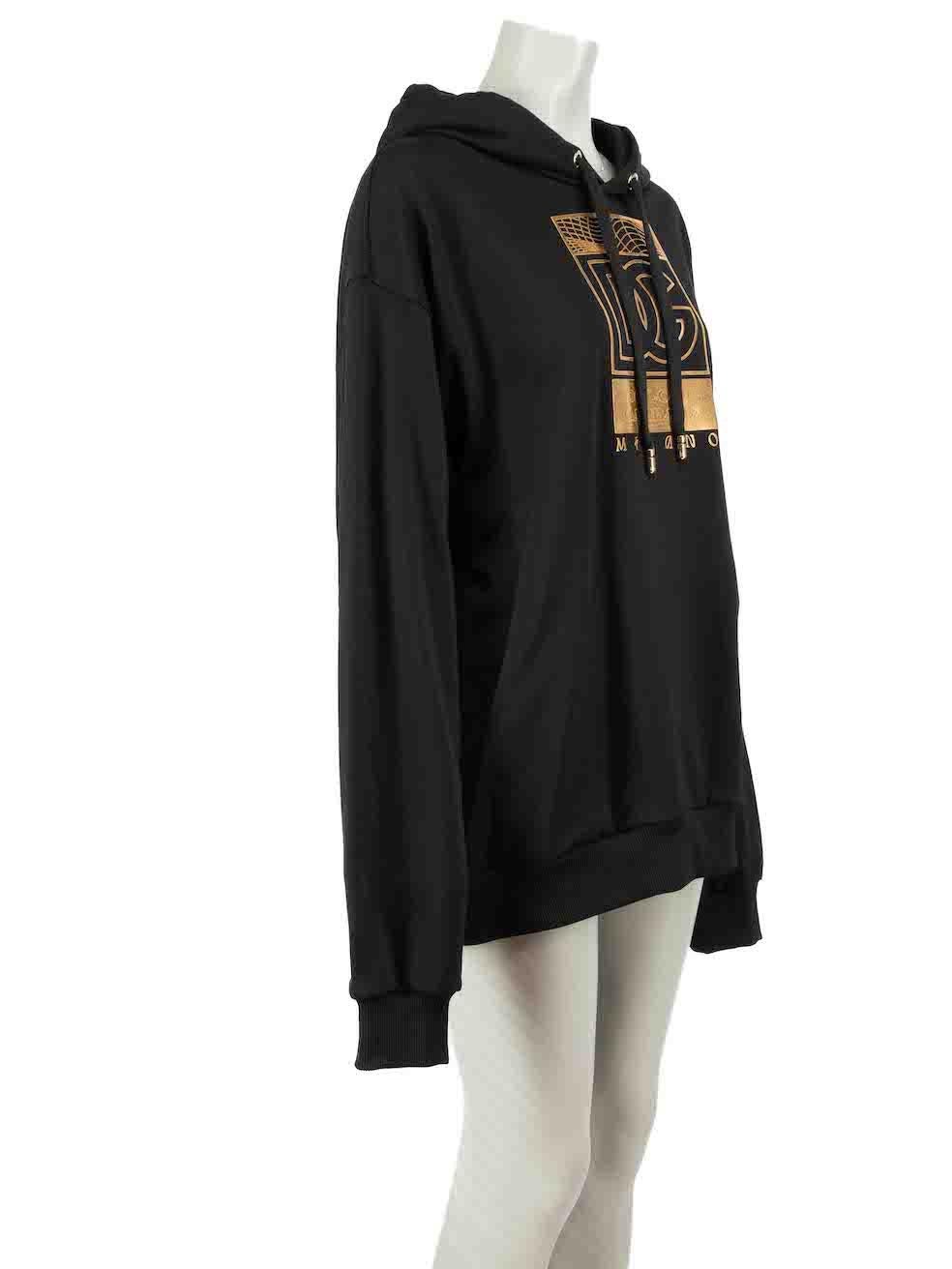 CONDITION is Never worn, with tags. No visible wear to hoodie is evident on this new Dolce & Gabbana designer resale item.
 
Details
Unisex
Black
Cotton
Long sleeves hoodie
Oversized fit
Gold tone Realt Parallela print
Hooded with drawstring

Made