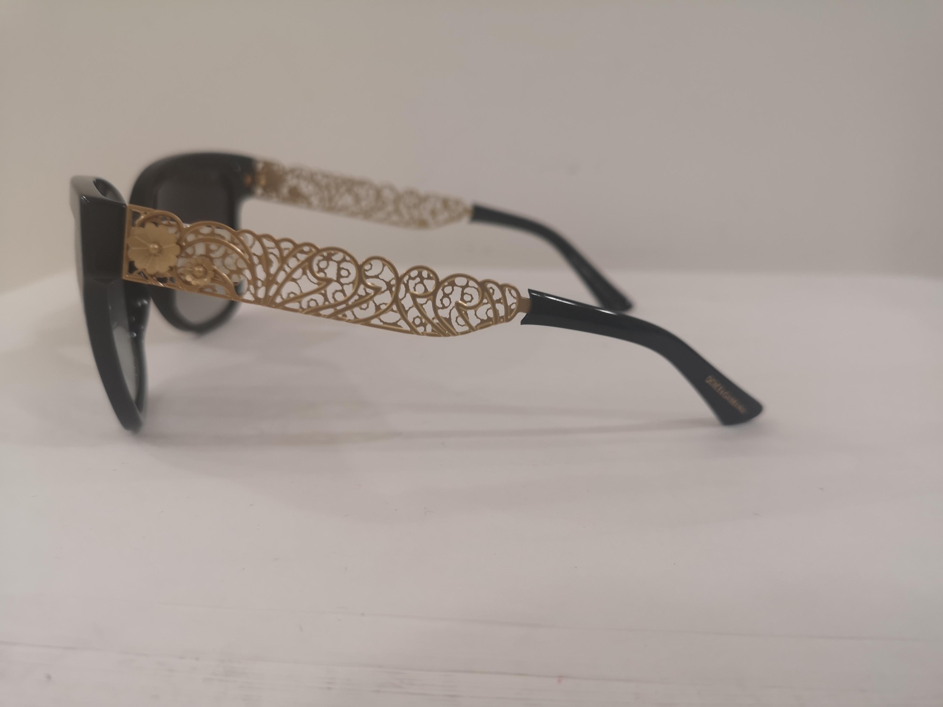 dolce and gabbana black and gold glasses