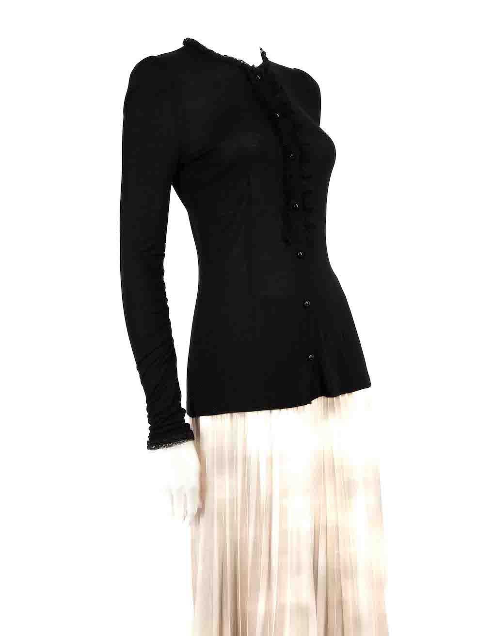 CONDITION is Very good. Hardly any visible wear to top is evident on this used Dolce & Gabbana designer resale item.
 
 
 
 Details
 
 
 Black
 
 Viscose
 
 Long sleeves top
 
 Lace trim detail
 
 Slightly see through
 
 Front button up closure
 
 

