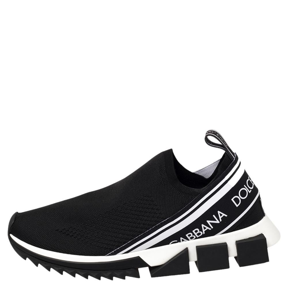 Flaunt your love for fashion by wearing these popular Sorrento slip-on sneakers from Dolce&Gabbana. These trendy black sneakers are versatile and can be worn on any occasion. They are expertly crafted from knit fabric and feature logo tape and pull
