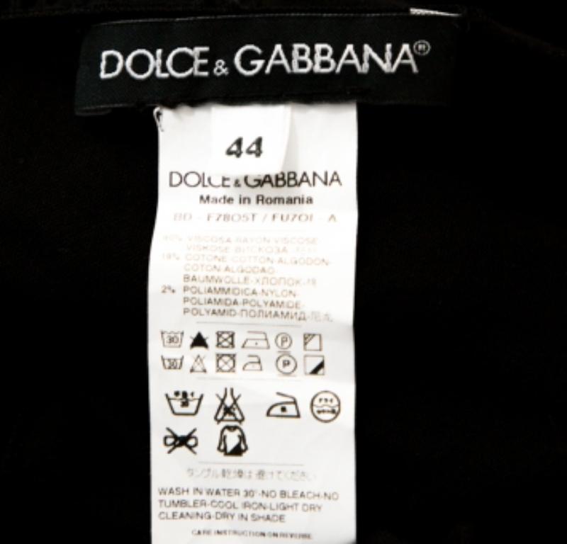 Holen Sie sich dieses Minikleid aus dem Hause Dolce & Gabbana. Dieses schwarze Kleid wurde aus hochwertigen MATERIALEN gefertigt und ist ideal für spontane Ausflüge. Dieses ärmellose Kleid ist an den Schultern, am Halsausschnitt und am Saum mit