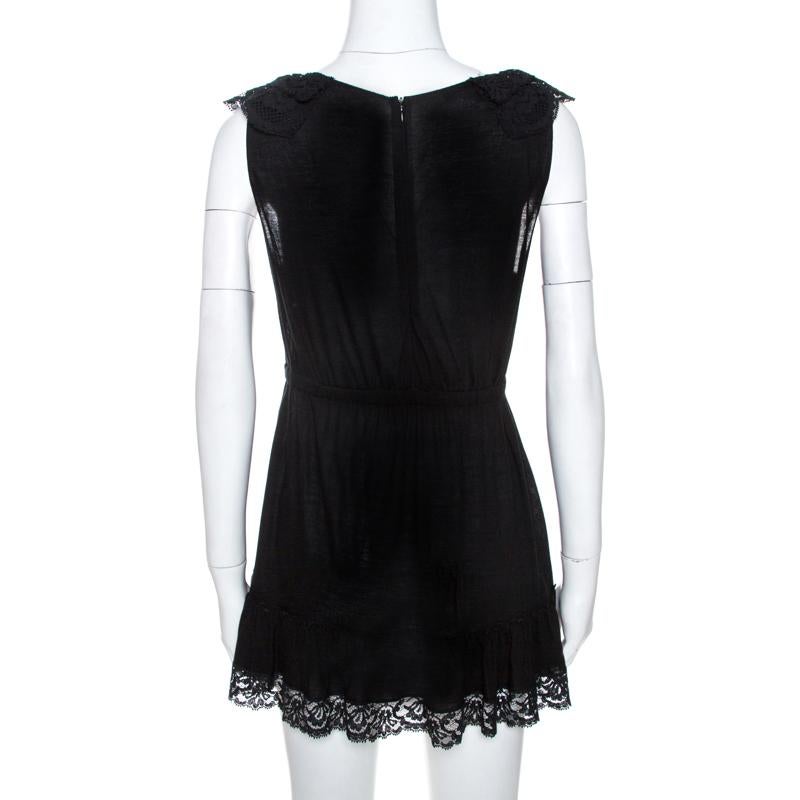 Get this mini dress that comes from the house of Dolce & Gabbana. This black dress has been crafted from quality materials and is great for impromptu outings. This sleeveless dress is styled with lace trims along the shoulders, neckline and hemline.