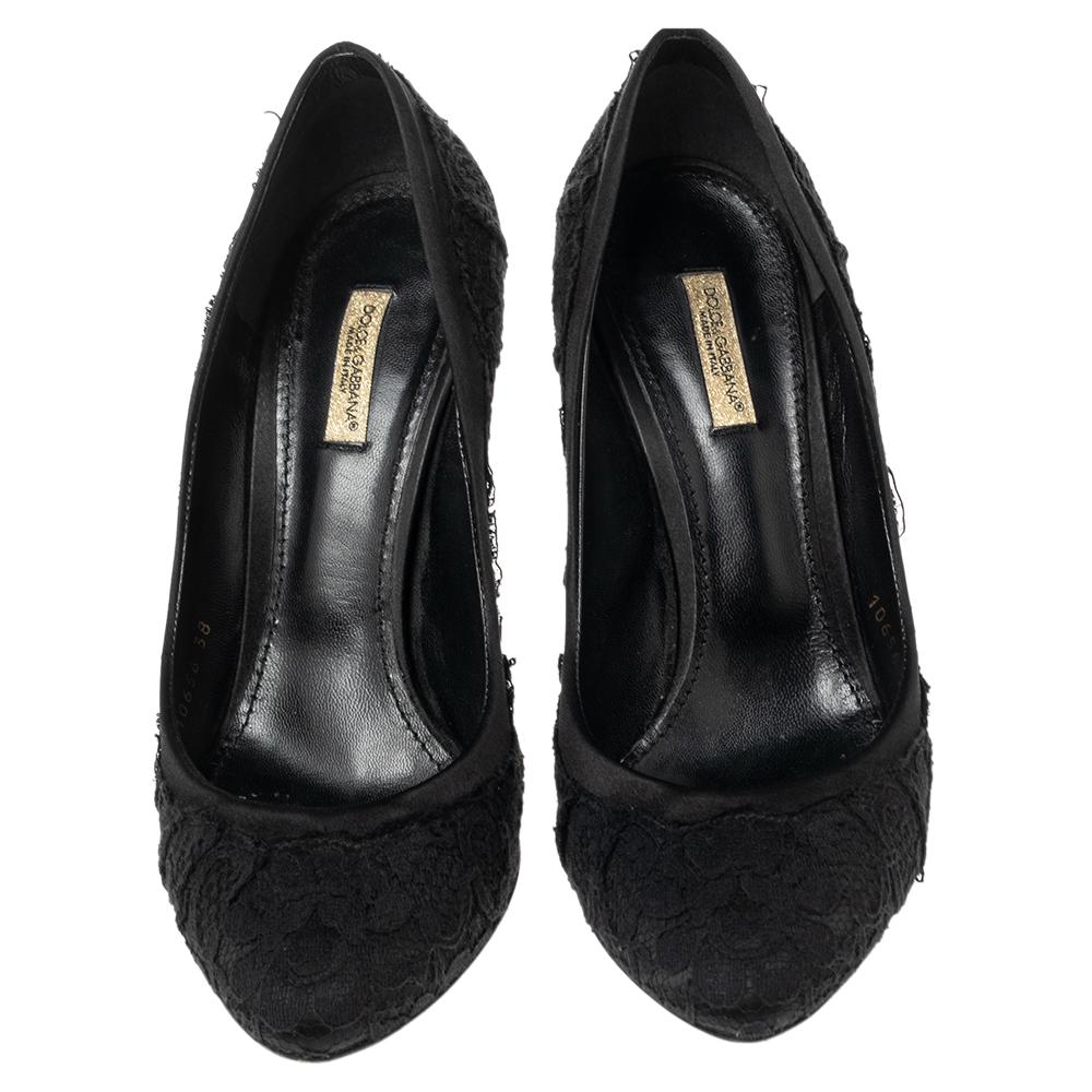 Every wardrobe should have a pair of shoes like this Dolce & Gabbana one in lace and satin. Beautifully crafted, they come with covered toes and 9 cm high heels. The insoles are leather-lined with brand detailing.

Includes: Original Dustbag,