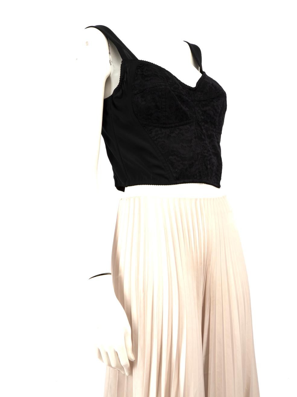 CONDITION is Very good. Minimal wear to top is evident. There is some loose stitching at the bottom of the zip on this used Dolce & Gabbana designer resale item.
  
  
  
  Details
  
  
  Black
  
  Synthetic
  
  Corset top
  
  Sleeveless
  
 